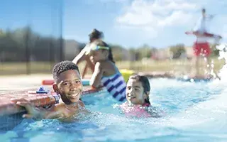 kids swimming in pool